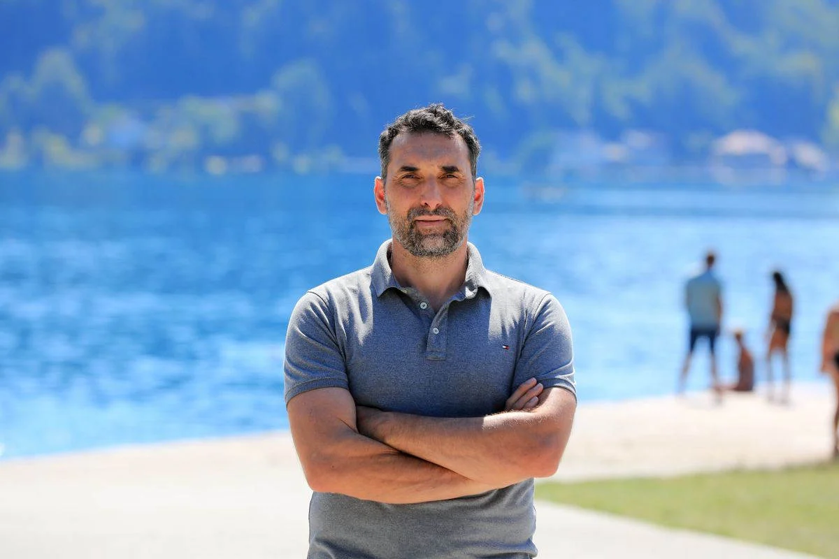Portrait of biotherapist Denis Zvegelj by Lake Bled